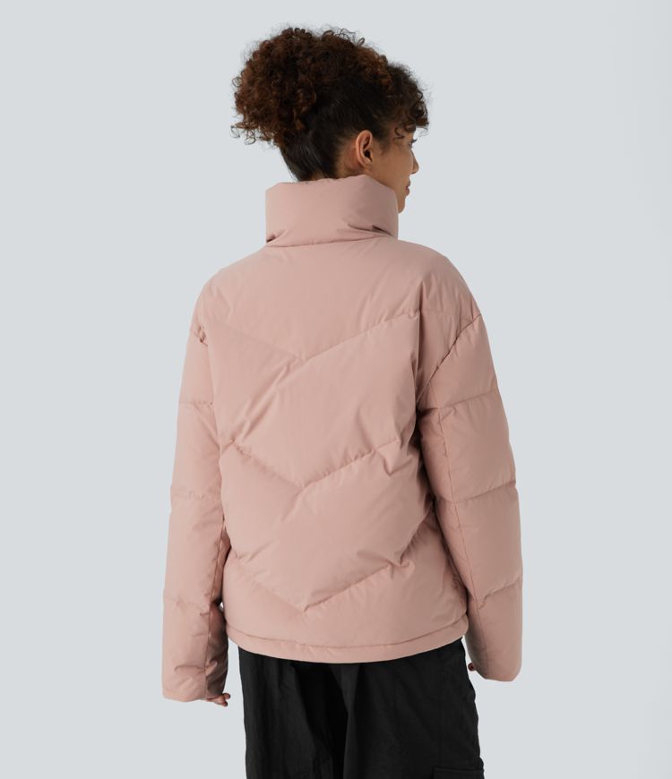 wasserabweisende steppjacke mit stehkragen tasche druckknopfverschluss kordelzug am saum und lässigem schnitt.