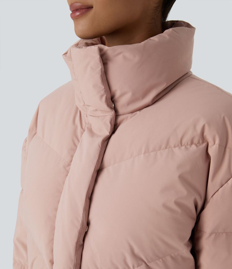 wasserabweisende steppjacke mit stehkragen tasche druckknopfverschluss kordelzug am saum und lässigem schnitt.