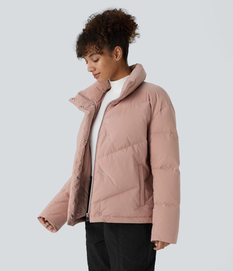 wasserabweisende steppjacke mit stehkragen tasche druckknopfverschluss kordelzug am saum und lässigem schnitt.