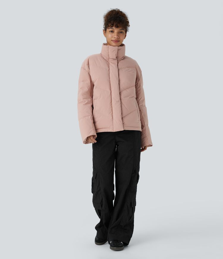 wasserabweisende steppjacke mit stehkragen tasche druckknopfverschluss kordelzug am saum und lässigem schnitt.
