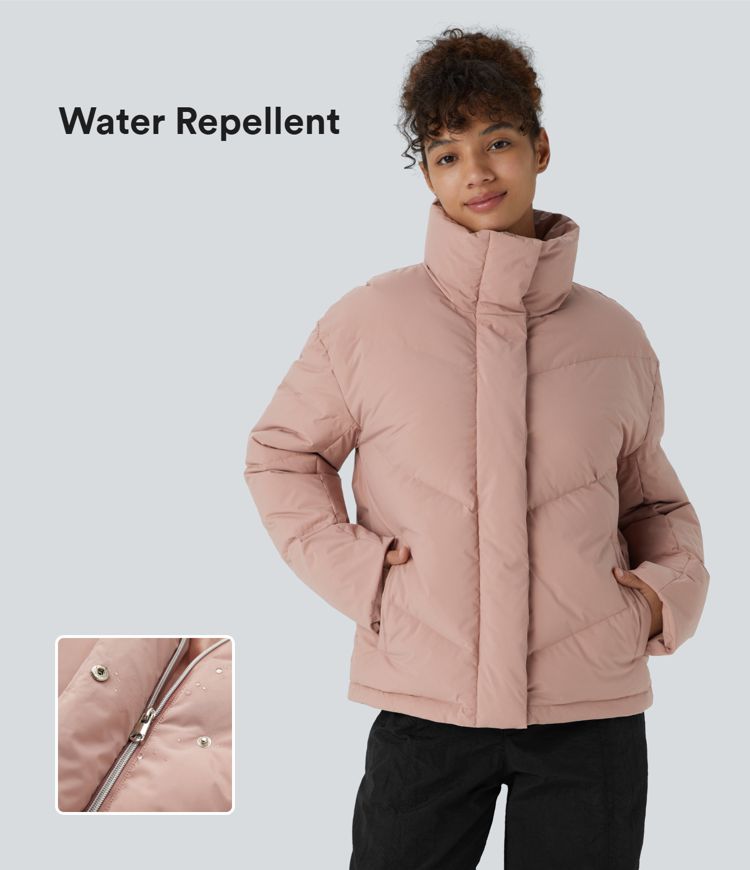 wasserabweisende steppjacke mit stehkragen tasche druckknopfverschluss kordelzug am saum und lässigem schnitt.
