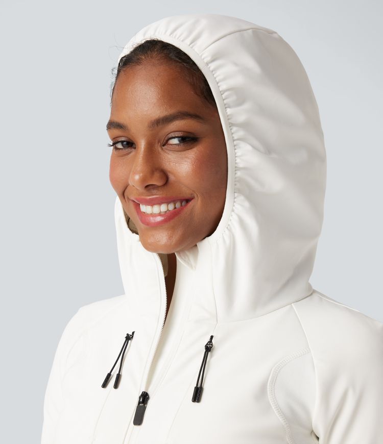 reflektierende daunen-laufjacke mit kapuze und taschen